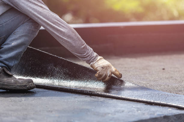 Professional Waterproofing technician working in Marshall, VA